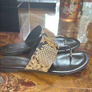 Tory Burch Black and Gold Sandals size 7 never warn. New with no box.